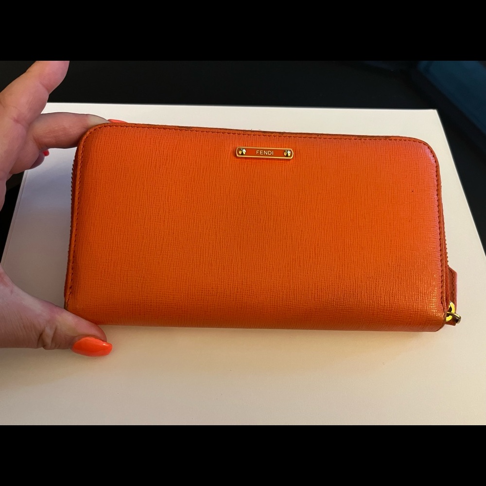 Fendi large orange zippy wallet